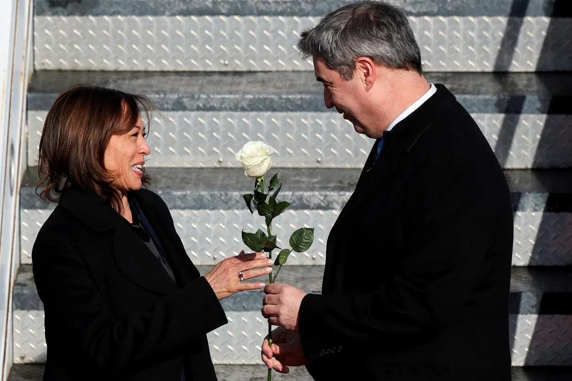 U.S. Vice President Kamala Harris is welcomed at Munich's airport by Bavarian state premier Markus Soeder before heading to the venue of this year's Security Conference in Munich, Germany, February 16, 2023. REUTERS/Leonhard Simon
