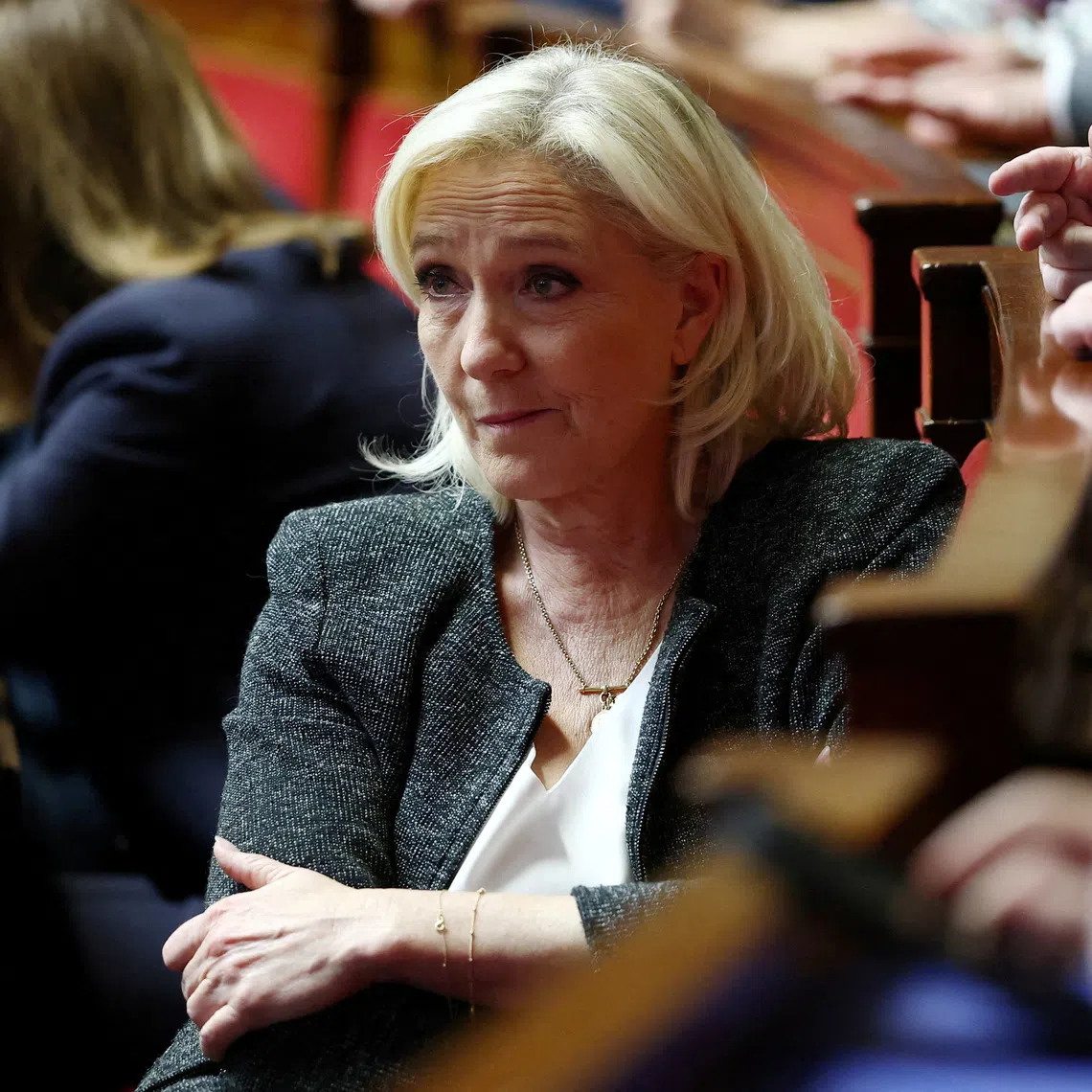 FILE PHOTO: French far-right leader and member of parliament Marine Le Pen, President of the French far-right National Rally (Rassemblement National - RN) party parliamentary group, is seen at the National Assembly in Paris, France, October 14, 2025. REUTERS/Gonzalo Fuentes/File Photo