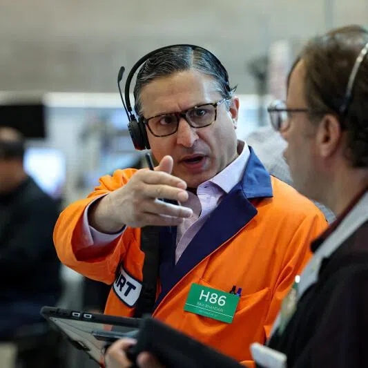 Futures-options traders work on the floor at the New York Stock Exchange in New York City, on June 8.