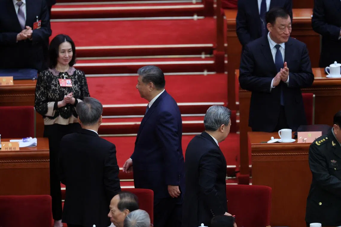 Chinese President Xi Jinping walks out at the end of the opening session of the Chinese People's Political Consultative Conference (CPPCC) at the Great Hall of the People in Beijing, China, March 4, 2025. REUTERS/Go Nakamura