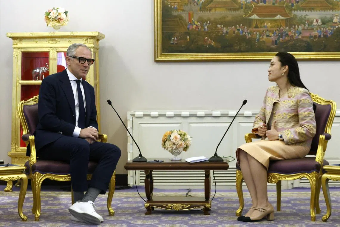 Formula One Group CEO Stefano Domenicali (left) speaks with Thai Prime Minister Paetongtarn Shinawatra (right) during a meeting at the Government House in Bangkok, Thailand.