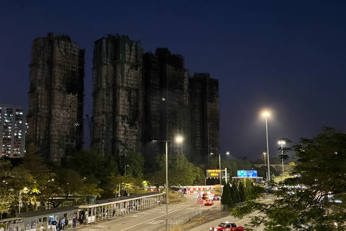 The charred towers of Wang Fuk Court in Tai Po after a devastating fire tore through the high-rise estate in November 2025.