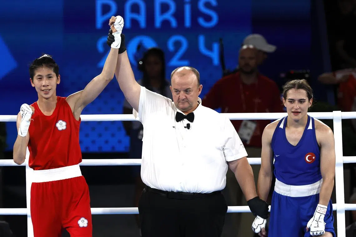 Chinese Taipei's Lin Yu-ting wins against Esra Yildiz Kahraman of Turkey in their women's 57kg semi-final bout at the Paris Olympics.