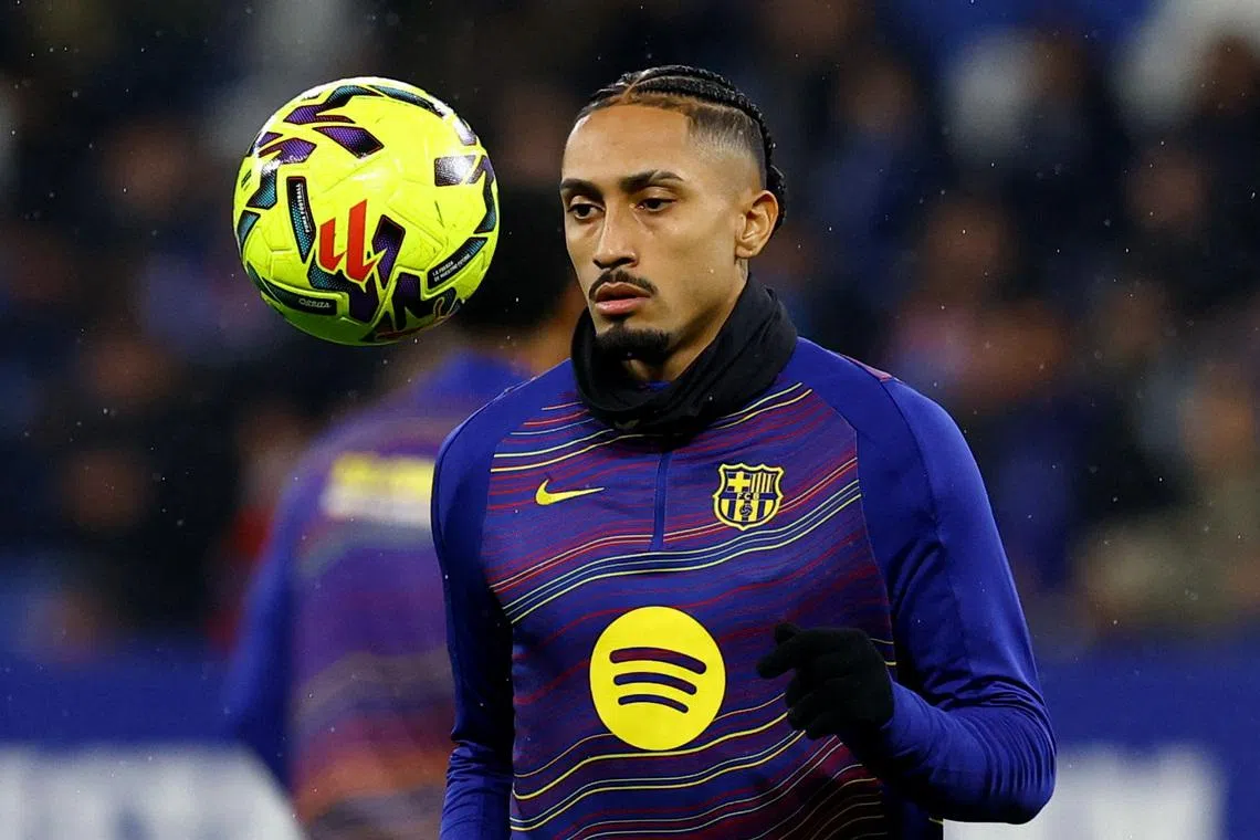 Soccer Football - LaLiga - Espanyol v FC Barcelona - RCDE Stadium, Cornella de Llobregat, Spain - January 3, 2026 FC Barcelona's Raphinha during the warm up before the match REUTERS/Albert Gea