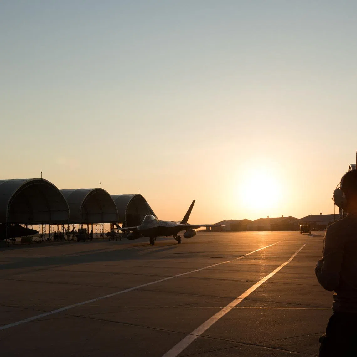 An F-22 Raptor from the 1st Fighter Wing, 27th Fighter Squadron taxis for departure deployment to Al Udeid Air Base, Qatar, from Joint Base Langley-Eustis, Virginia, U.S., June 24, 2019. Kaylee Dubois/U.S. Air Force/Handout via REUTERS/File Photo