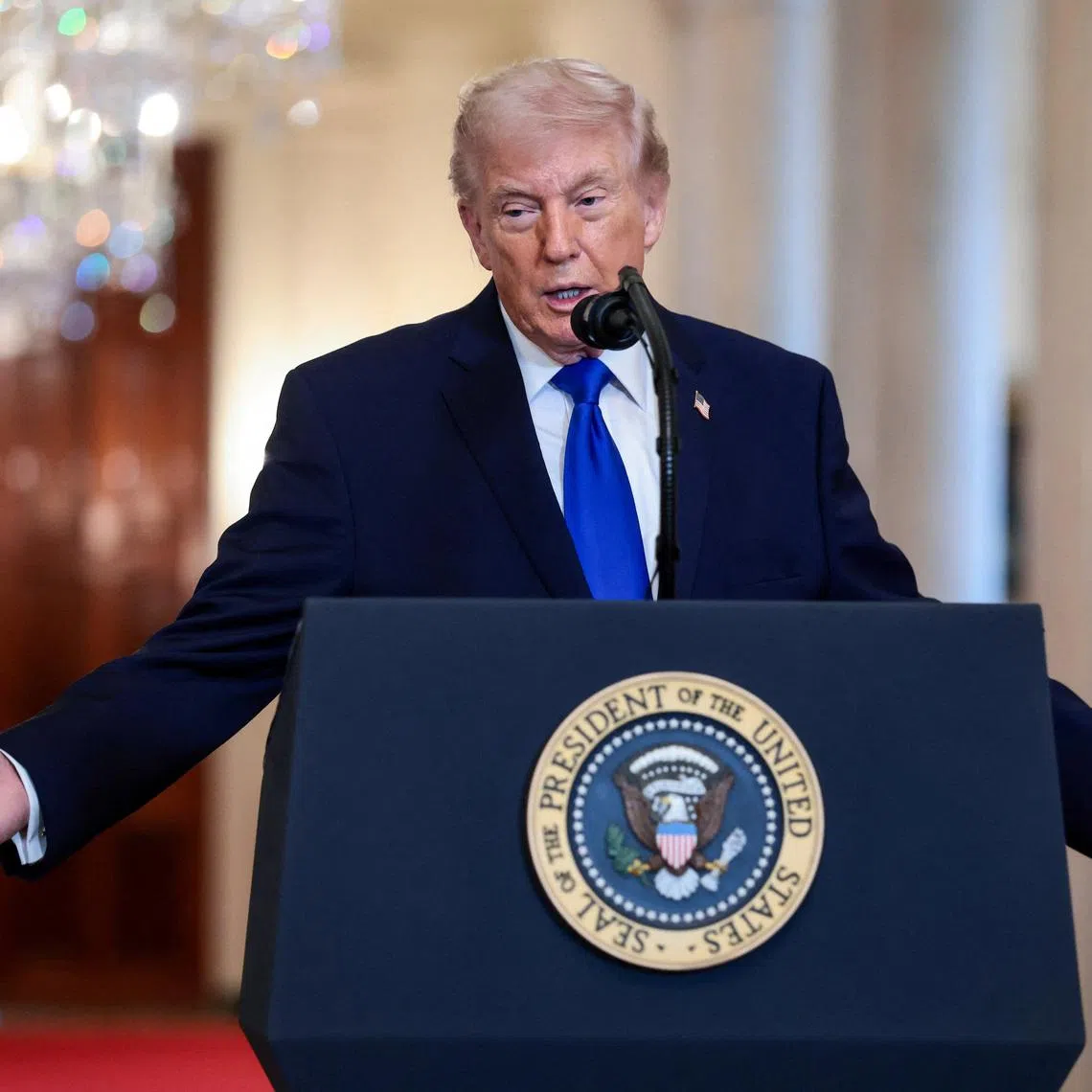 U.S. President Donald Trump speaks during an event to honor \"Angel Families\" who have lost family members to crimes committed by people in the country illegally, at the White House in Washington, D.C., U.S., February 23, 2026. REUTERS/Evelyn Hockstein