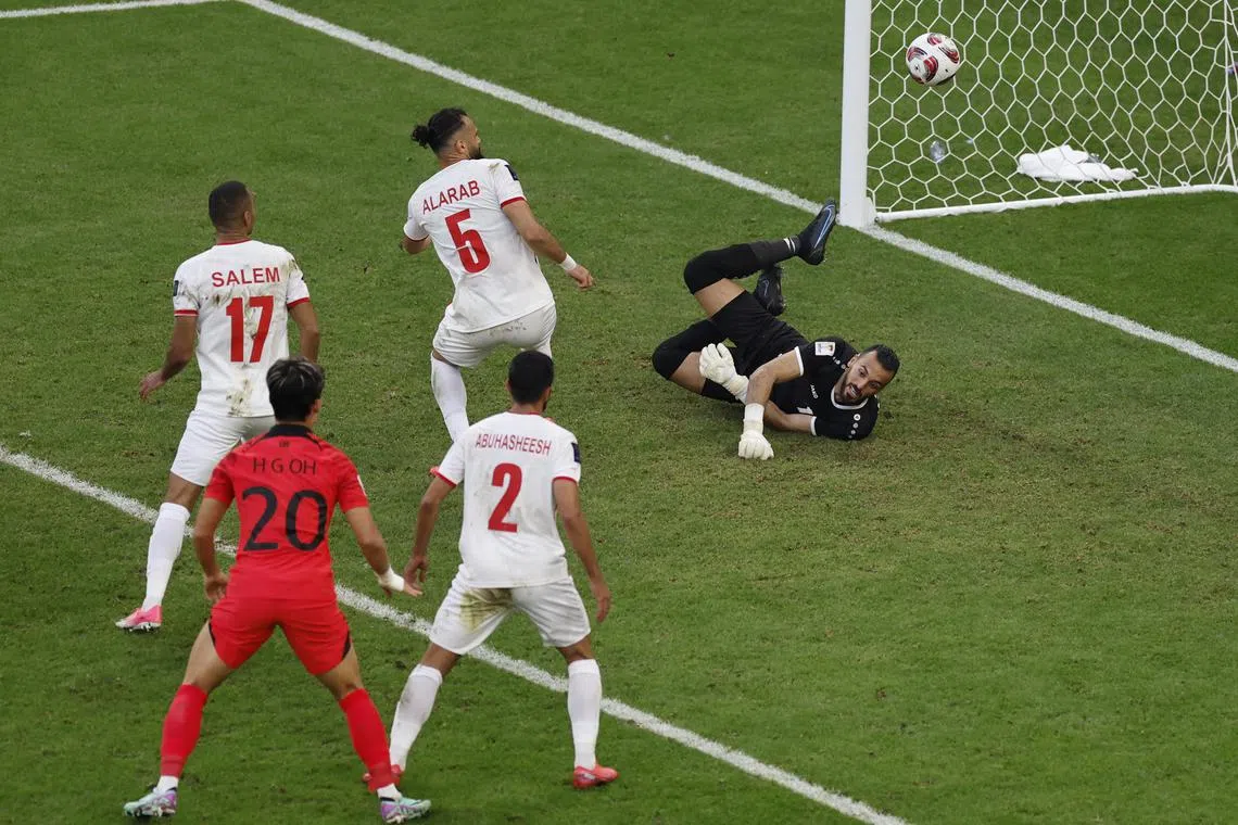 Jordan's Yazan Al Arab scores an own goal and South Korea's second in the 2-2 Asian Cup draw.