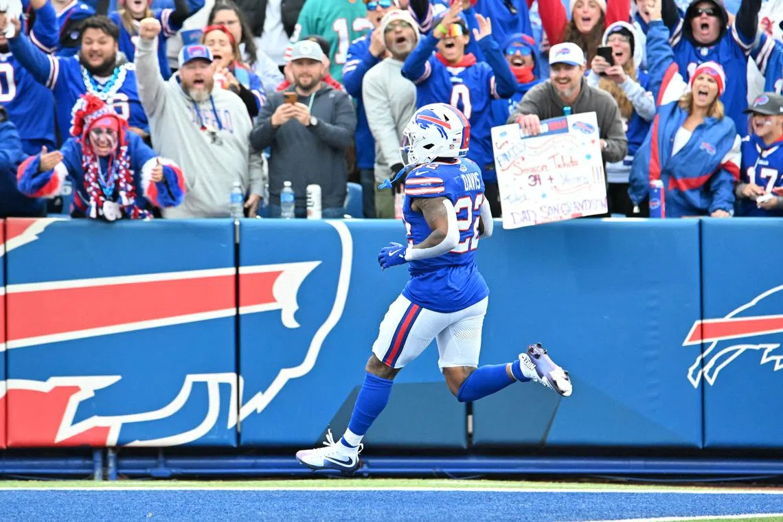 FILE PHOTO: Nov 3, 2024; Orchard Park, New York, USA; Buffalo Bills running back Ray Davis (22) scores a touchdown against the Miami Dolphins in the third quarter at Highmark Stadium. Mandatory Credit: Mark Konezny-Imagn Images/File Photo