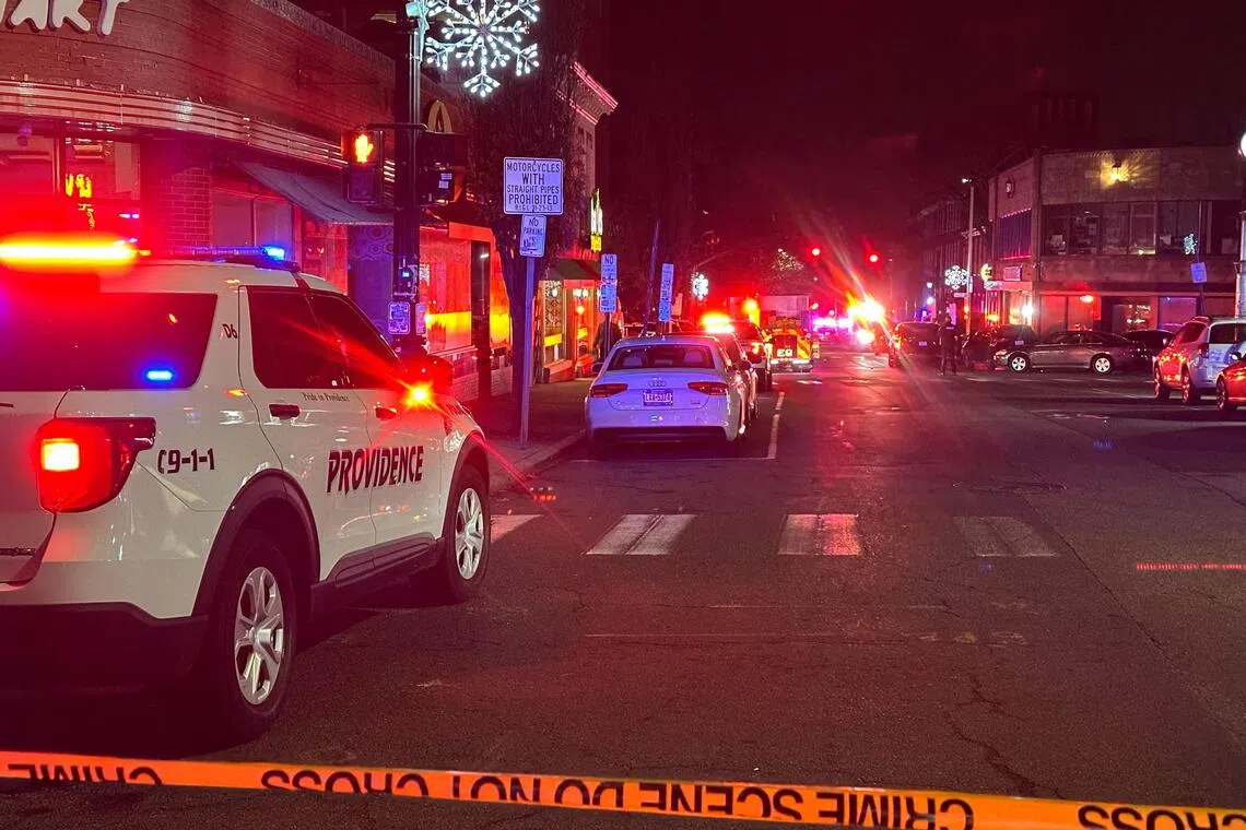 A police vehicle stands near the site of a mass shooting reported by authorities at Brown University in Providence, Rhode Island, on Dec 13, 2025.