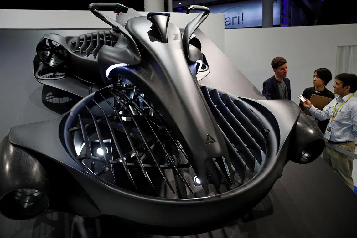  A.L.I technology's Xturismo air-mobility hover bike is displayed at the Tokyo Motor Show, in Tokyo, Japan October 24, 2019. REUTERS/Edgar Su/File Photo