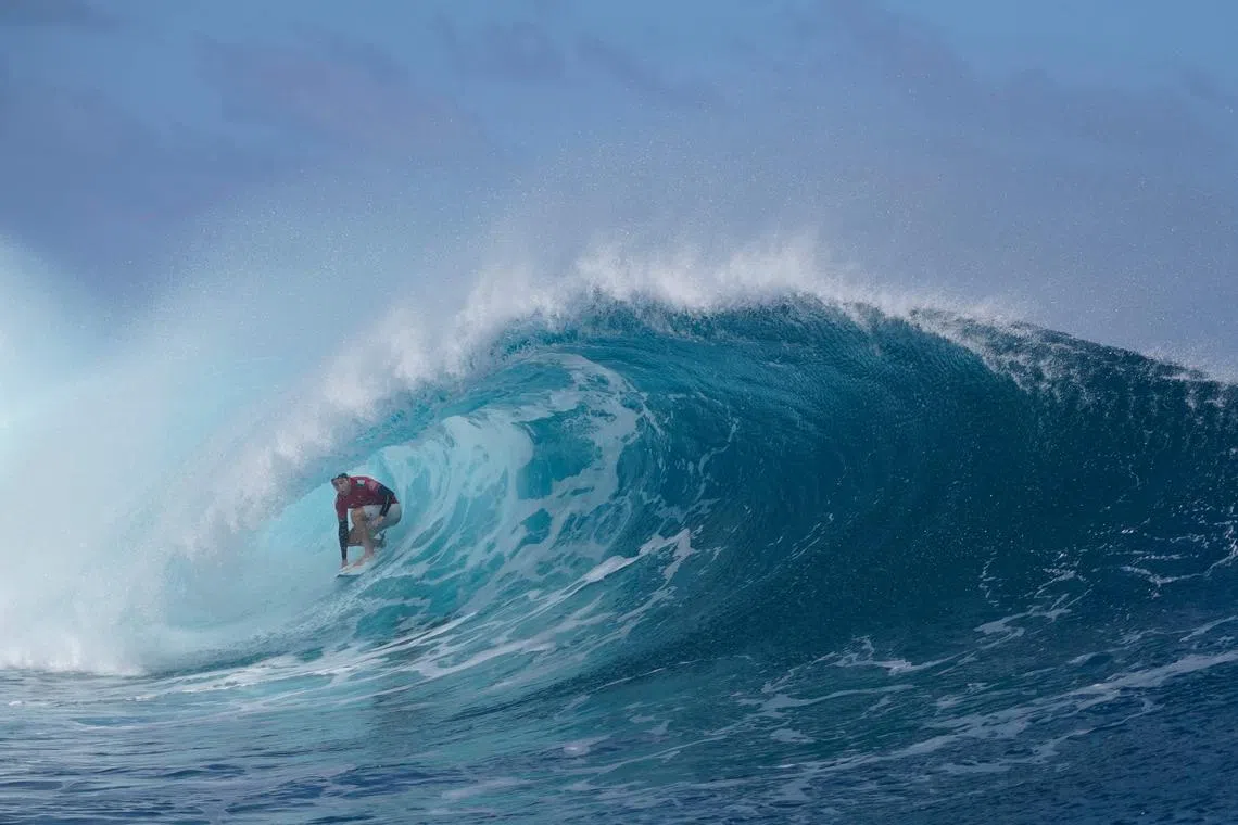 Italy's Leonardo Fioravanti competes at Teahupo'o in Tahiti during the WSL's Shiseido Tahiti pro surfing event.