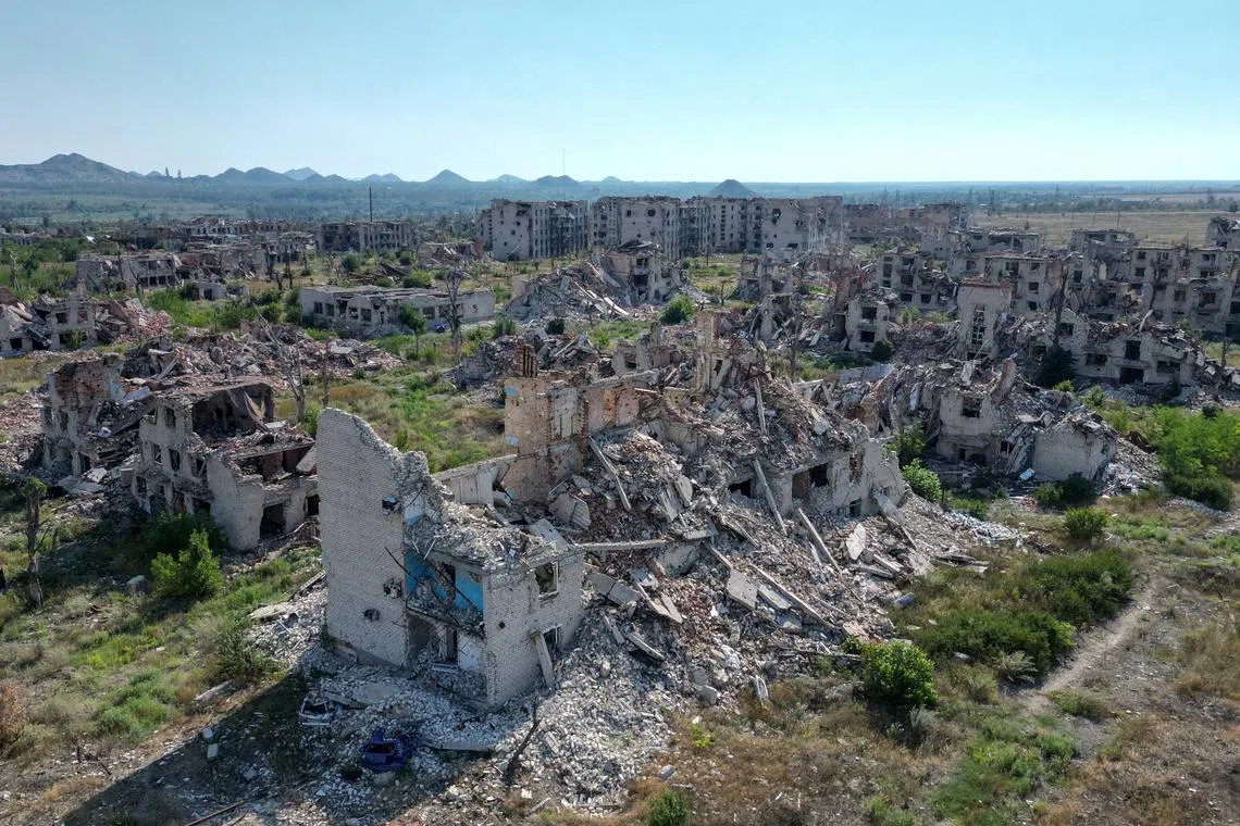 A drone view shows the ruins of residential buildings in the abandoned town of Marinka (Maryinka), which was destroyed in the course of Russia-Ukraine conflict in the Donetsk region, a Russian-controlled area of Ukraine, August 7, 2025. REUTERS/Alexander Ermochenko/File Photo