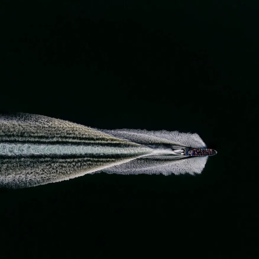 A boat full of migrants heading from Panama to Colombia in May on a reverse migration route.