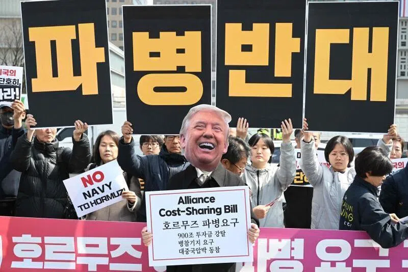 Protesters rallying outside the American embassy in Seoul on March 15 against US President Donald Trump's call to South Korea and other countries to send warships to the Strait of Hormuz.