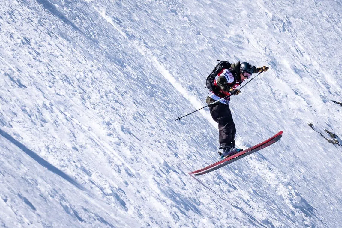 (FILES) United States Ross Tester competes to place second in the ski event during the Freeride World Tour finals Verbier Xtreme on the Bec de Rosses mountain above the Swiss Alps resort of Verbier, on March 20, 2025. The International Olympic Committee (IOC) added freeride skiing and snowboarding events, as well as synchronised skating, to the programme for the 2030 Winter Olympics, while dropping Nordic combined. The Games, due to be held in and around the French Alps, will also be the first Winter Olympics to achieve gender parity. (Photo by Maxime SCHMID / AFP)