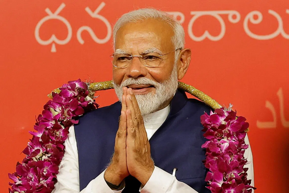 Indian Prime Minister Narendra Modi gestures, at the Bharatiya Janata Party (BJP) headquarters in New Delhi, India, June 4, 2024. REUTERS/Adnan Abidi