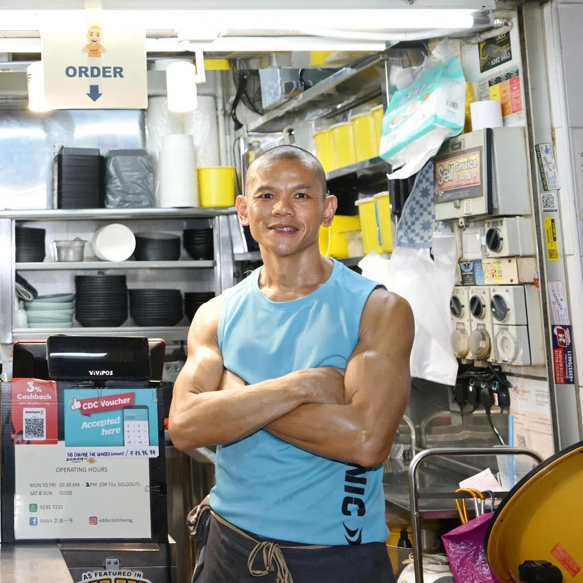 Quick-thinking hawker Eddy Wan, 45, turned hero when he saved his 80-year-old hawker neighbour from his burning stall. 