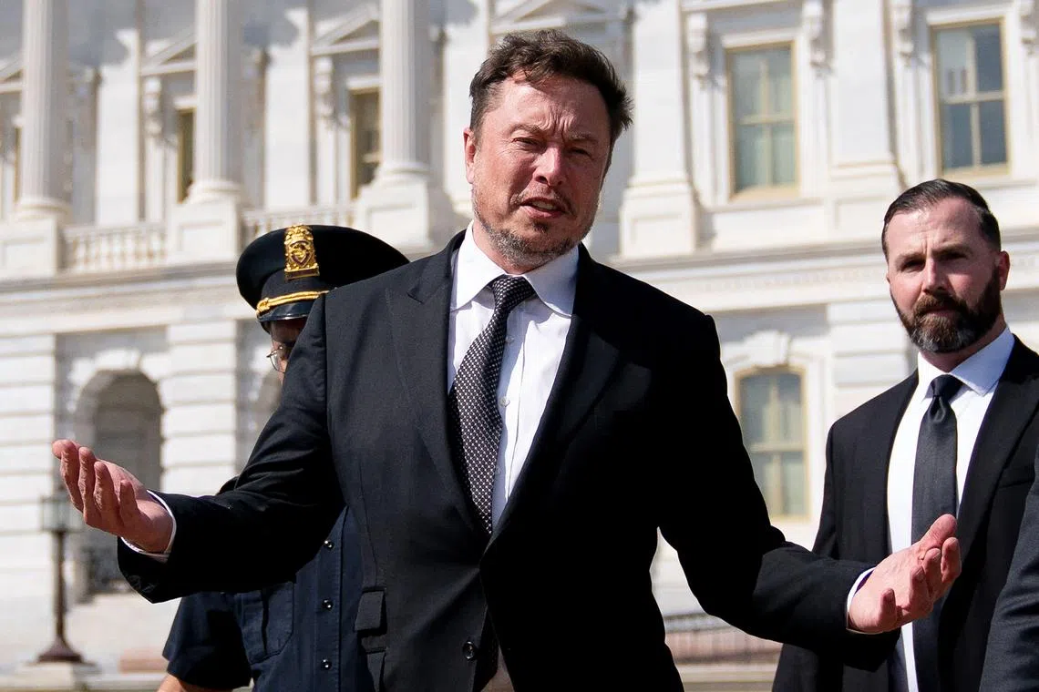 Elon Musk departs after meeting US House Speaker Kevin McCarthy at the US Capitol in Washington.