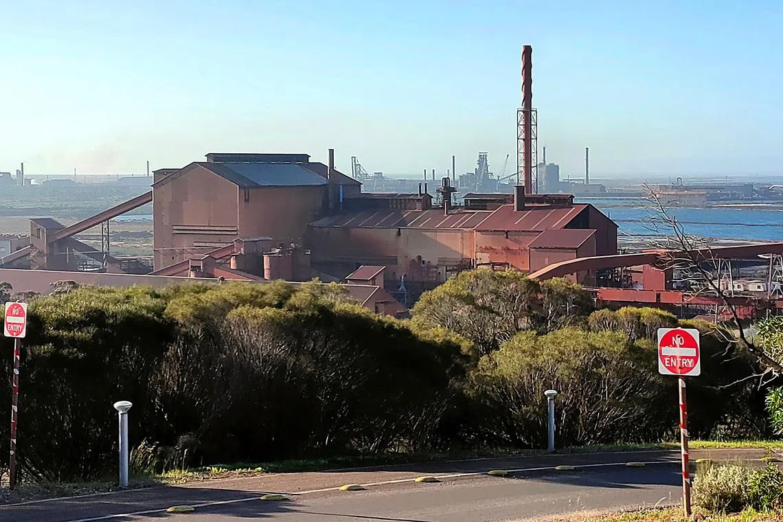 This handout photo taken by Nicholas Williams-Chamarro on August 26, 2023 shows the Whyalla steelworks in Whyalla, South Australia. The failing Australian major steel plant at Whyalla, owned by British billionaire Sanjeev Gupta's company GFG Alliance, will be transformed into a hub for making "green iron and steel", Prime Minister Anthony Albanese said Thursday as the government stepped in with a billion-dollar rescue package. (Photo by Nicholas Williams-Chamarro / AFP) / RESTRICTED TO EDITORIAL USE - MANDATORY CREDIT "AFP PHOTO / NICHOLAS WILLIAMS-CHAMARRO" - NO MARKETING NO ADVERTISING CAMPAIGNS - DISTRIBUTED AS A SERVICE TO CLIENTS
