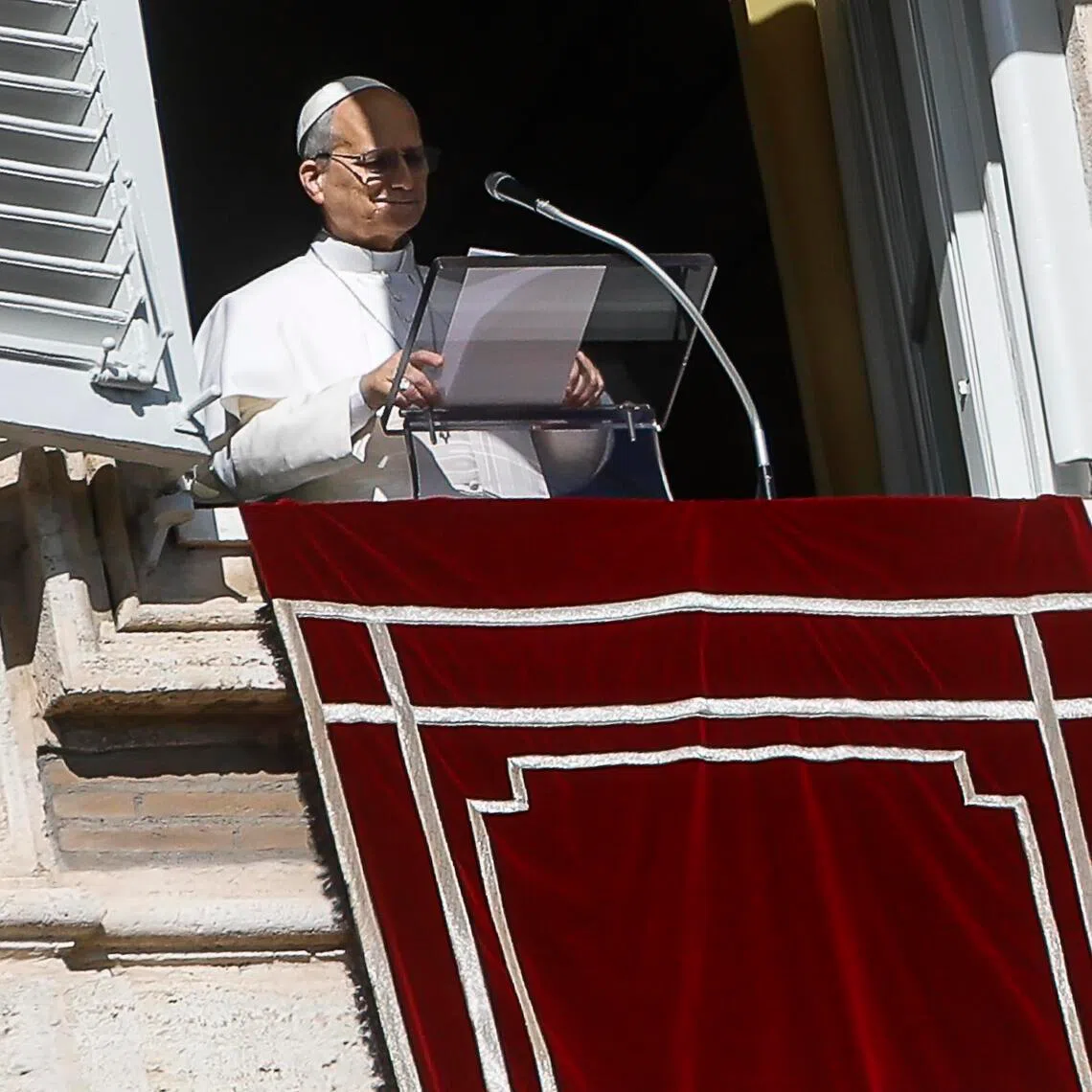 epa12742454 Pope Leo XIV during the Angelus prayer, traditional Sunday's prayer, from the window of his office overlooking Saint Peter's Square, Vatican City, 15 February 2026.  EPA/ANGELO CARCONI