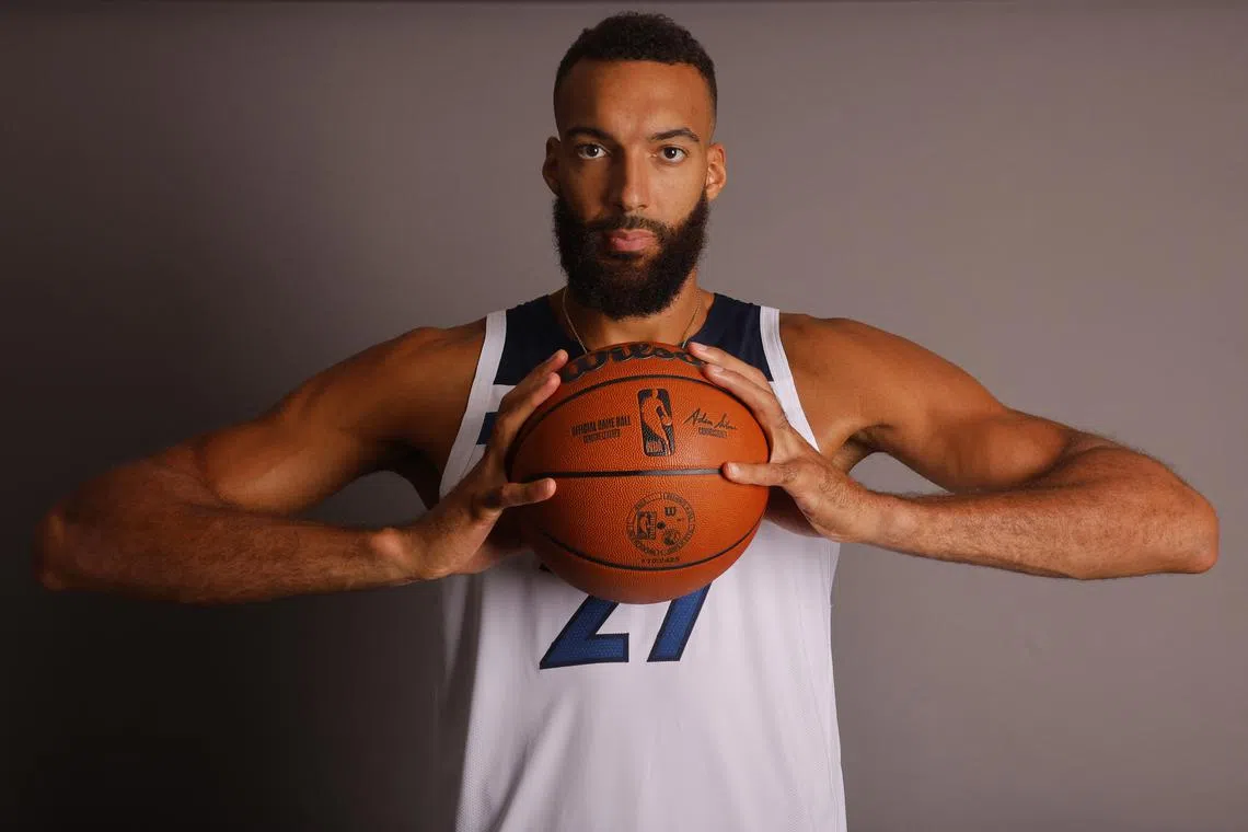 FILE PHOTO: Sep 30, 2024; Minneapolis, MN, USA; Minnesota Timberwolves center Rudy Gobert (27) poses for photos on media day at Target Center in Minneapolis. Mandatory Credit: Bruce Kluckhohn-Imagn Images/File Photo