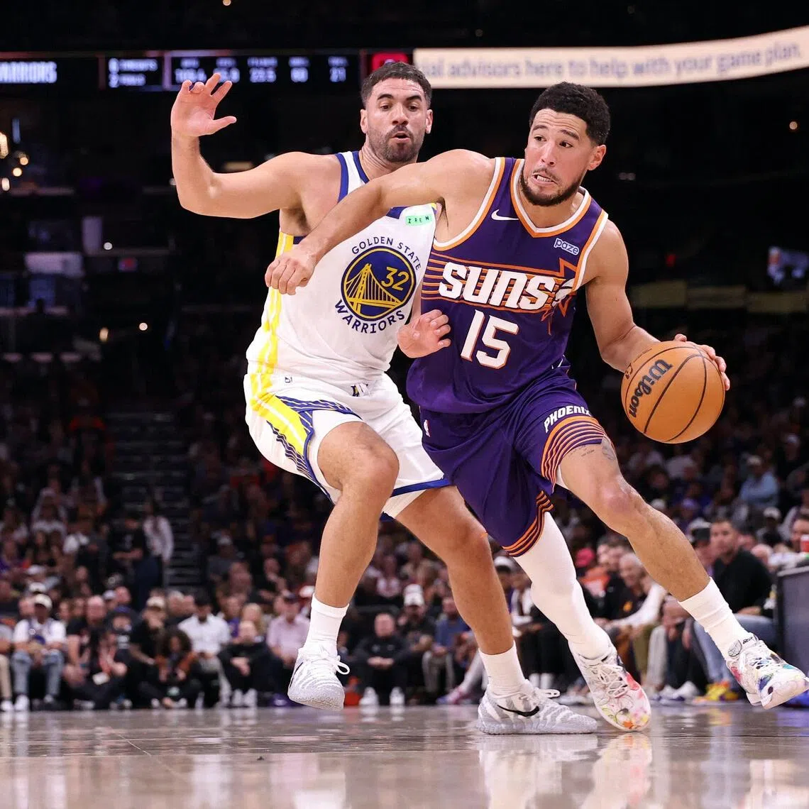 Devin Booker (in the number 15 jersey) had 43 points, seven assists and seven rebounds to help of the Phoenix Suns beat Golden State Warriors 131-122 on Oct 24.