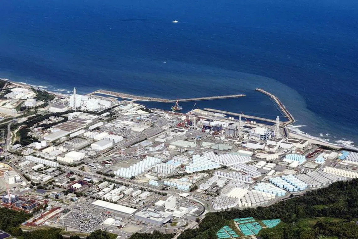 FILE PHOTO: An aerial view shows the Fukushima Daiichi nuclear power plant, which started releasing treated radioactive water into the Pacific Ocean, in Okuma town, Fukushima prefecture, Japan August 24, 2023, in this photo taken by Kyodo. Kyodo/via REUTERS/File Photo/File Photo