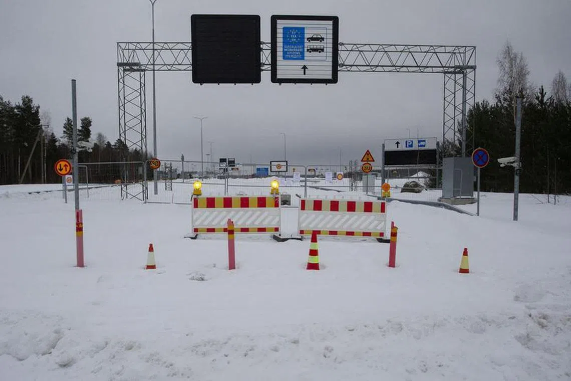 FILE PHOTO: Barriers are placed at the closed Vaalimaa border check point between Finland and Russia in Virolahti, Finland, January 14, 2024. Finland, which shut all eight checkpoints along its eastern frontier with Russia again in December 2023 amid suspicions that Russian authorities were deliberately funneling undocumented asylum seekers to Finnish crossings, decided on January 11 that the border with Russia will remain closed until February 11. Lehtikuva/Lauri Heino/via REUTERS/File Photo