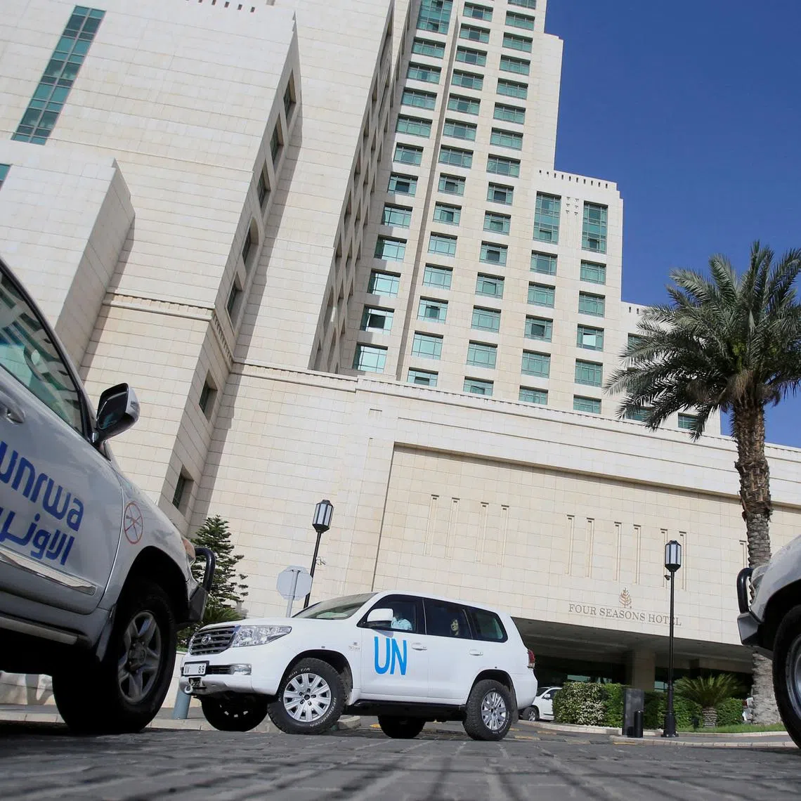 FILE PHOTO: The United Nation vehicles carrying the Organisation for the Prohibition of Chemical Weapons (OPCW) inspectors is seen in Damascus, Syria April 18, 2018. REUTERS/ Ali Hashisho/File Photo