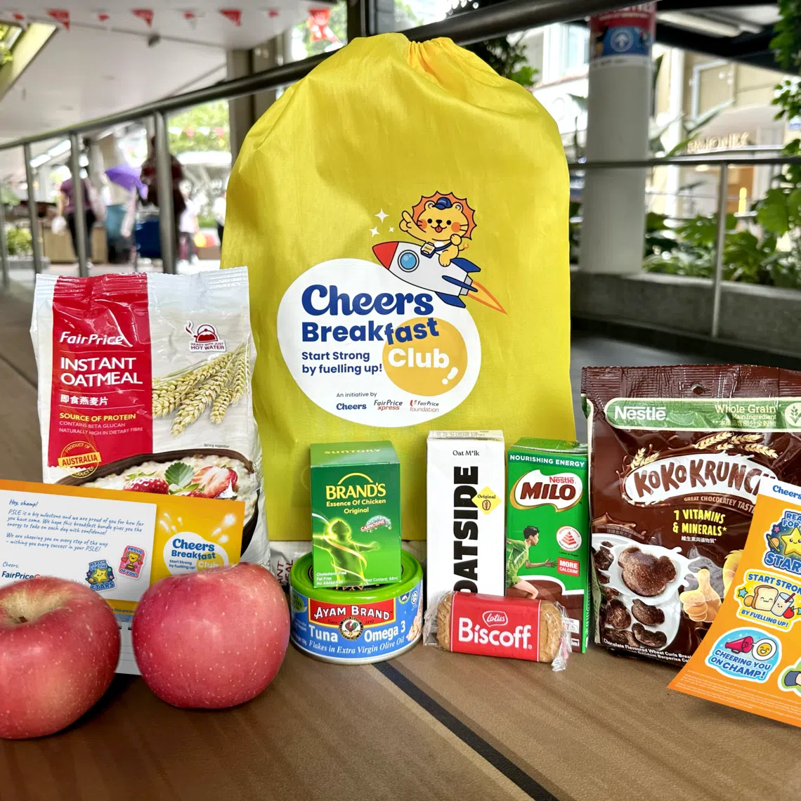 Each bundle includes apples, cereal, chicken essence and oat milk.