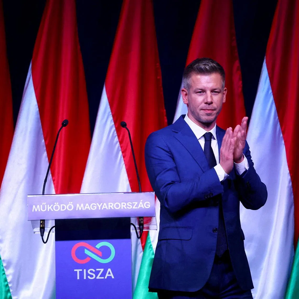 FILE PHOTO: Peter Magyar, leader of the opposition TISZA party, reacts after his campaign start speech in Budapest, Hungary, February 21, 2026. REUTERS/Bernadett Szabo/File Photo