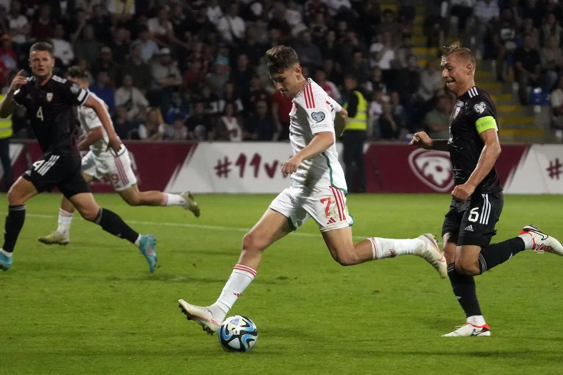 Wales' David Brooks scoring their second goal against Latvia.