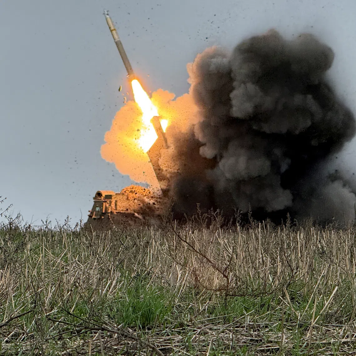 Ukrainian servicemen fire a multiple launch rocket system towards Russian troops near the front-line town of Pokrovsk in Donetsk region, Ukraine, on Dec 9.