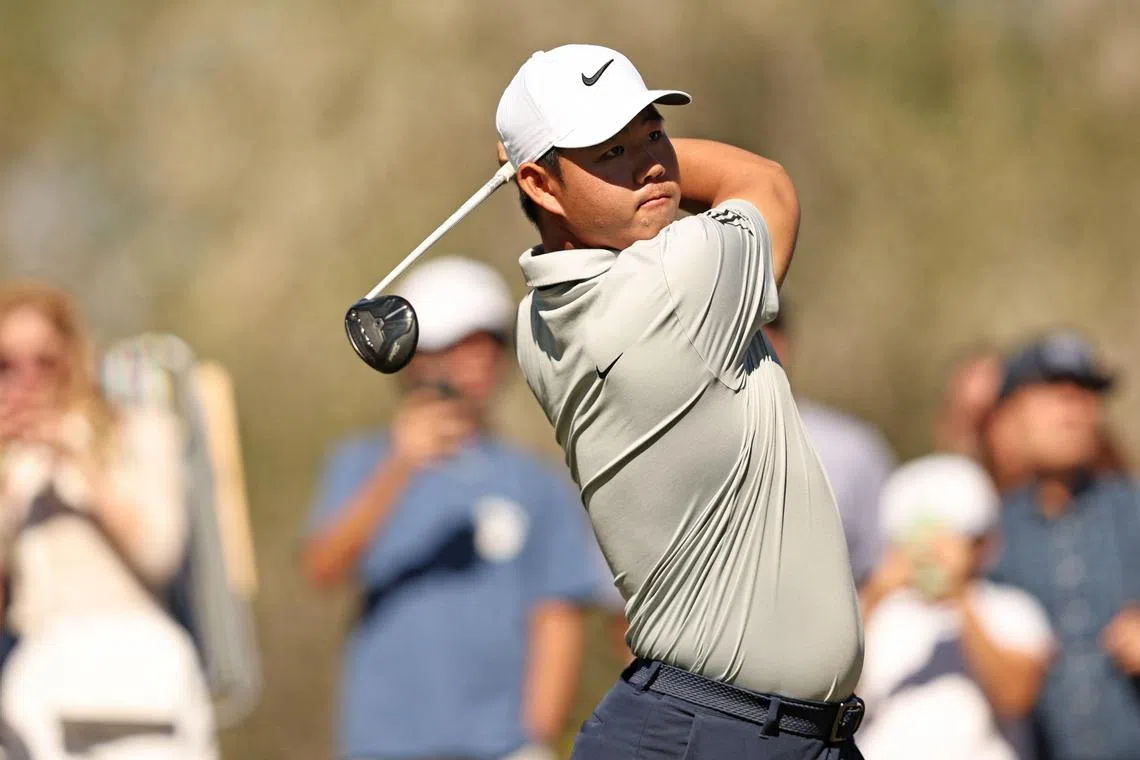 Tom Kim of South Korea playing his shot from the fourth tee during the third round of the Shriners Children's Open at TPC Summerlin on Saturday in Las Vegas. He is tied at the top of the leaderboard with Canada’s Adam Hadwin and American Lanto Griffin on 15-under 198.