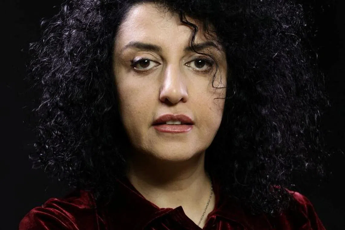 Iranian human rights activist and the vice president of the Defenders of Human Rights Center (DHRC) Narges Mohammadi poses in this undated handout picture. Mohammadi family archive photos/Handout via REUTERS/File Photo