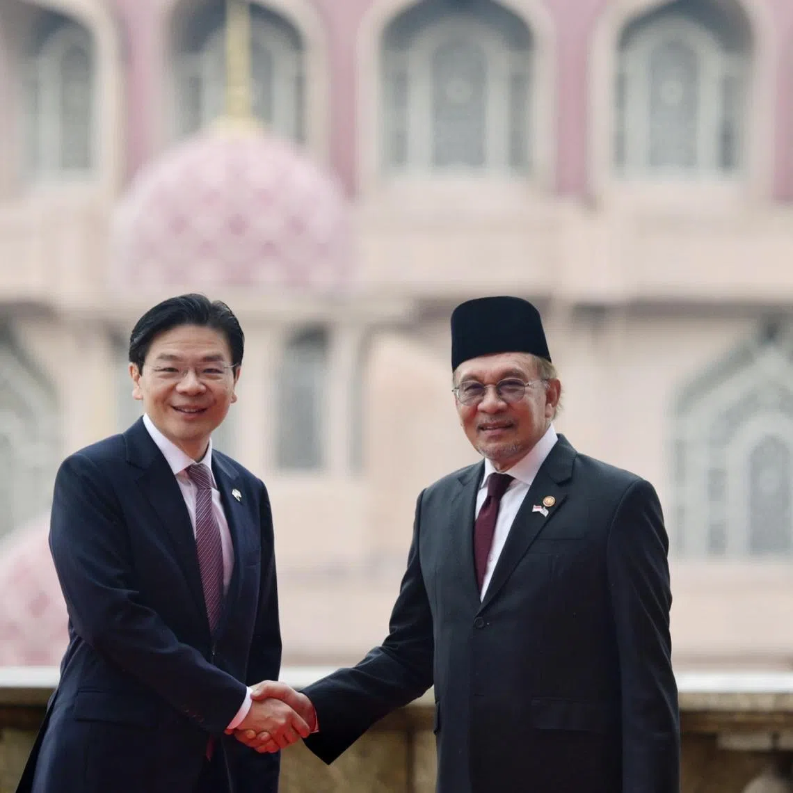 Prime Minister Lawrence Wong with Malaysian Prime Minister Anwar Ibrahim at Perdana Putra on Jan 7, during the Leaders' Retreat.