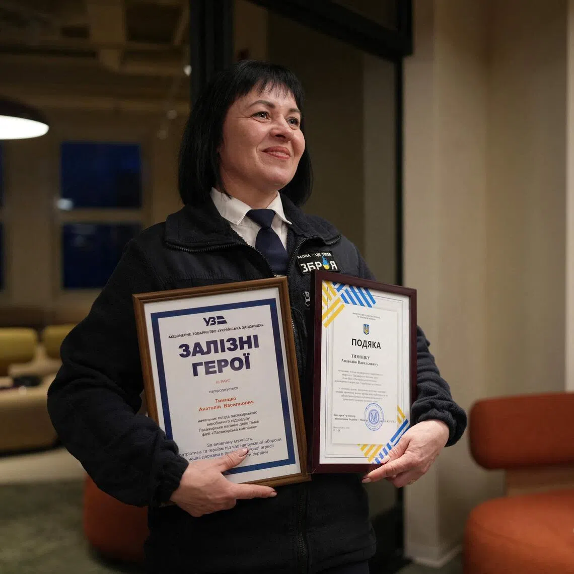 Ukrainian train attendant Olga Terletska is honoured at a ceremony in Kyiv for her actions on Jan 27, when Russia targeted a train in Ukraine's Kharkiv region, killing five people.