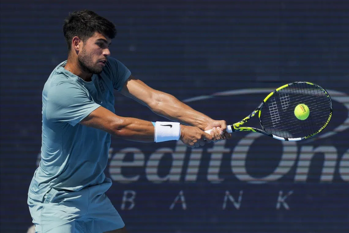 Aug 18, 2025; Cincinnati, OH, USA;  Carlos Alcaraz (ESP) returns a shot against Jannik Sinner (ITA) during the Cincinnati Open at the Lindner Family Tennis Center. Mandatory Credit: Aaron Doster-Imagn Images/File Photo