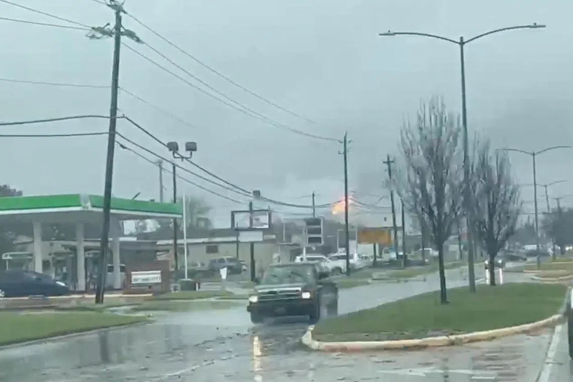 Damage caused by a tornado seen in a video screengrab obtained from social media, in Deer Park, Texas, on Jan 24, 2023.