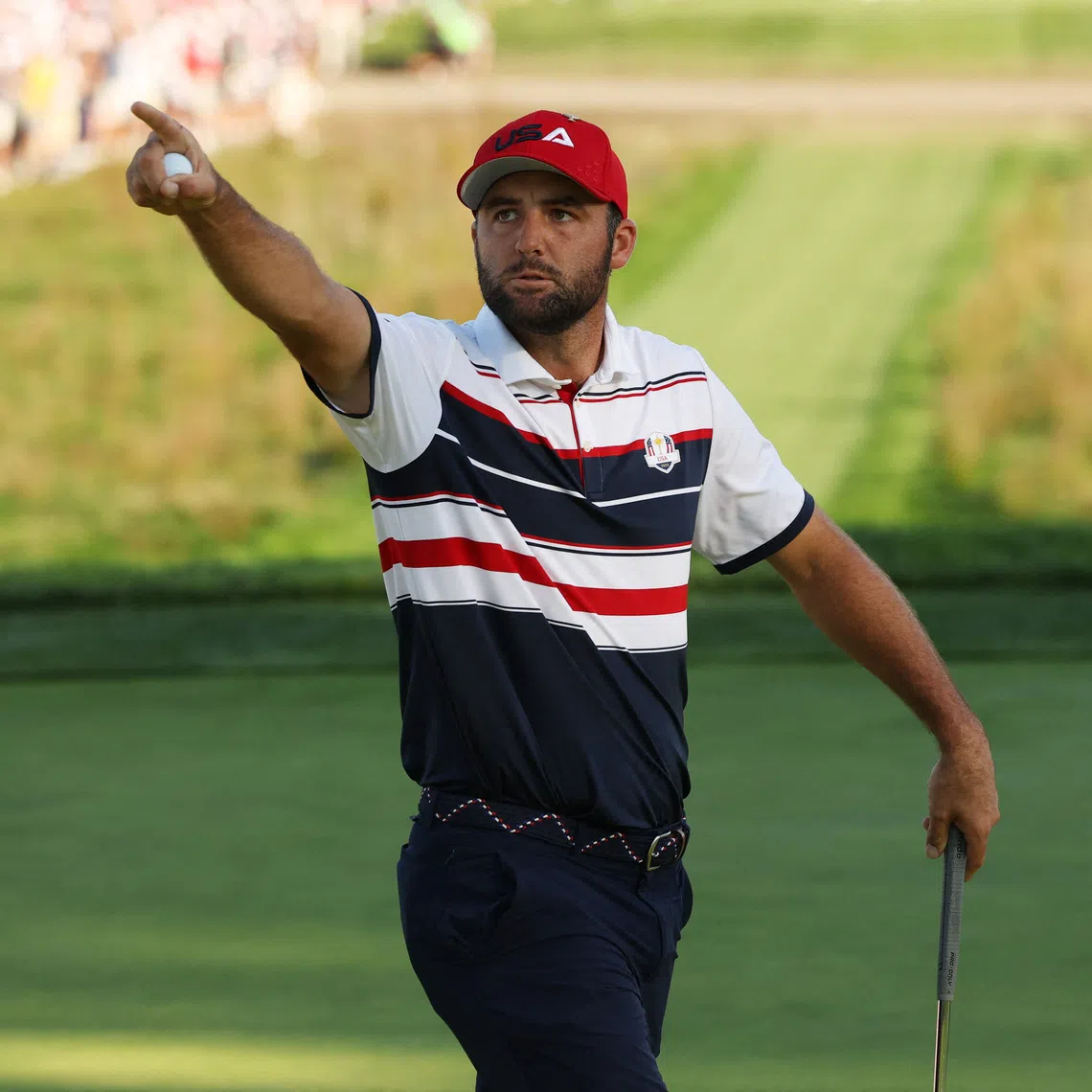 FILE PHOTO: Golf - The 2025 Ryder Cup - Bethpage Black Golf Course, Farmingdale, New York, United States - September 28, 2025 Team USA's Scottie Scheffler celebrates after holing his putt on the 17th hole during the singles REUTERS/Brendan Mcdermid/ File Photo