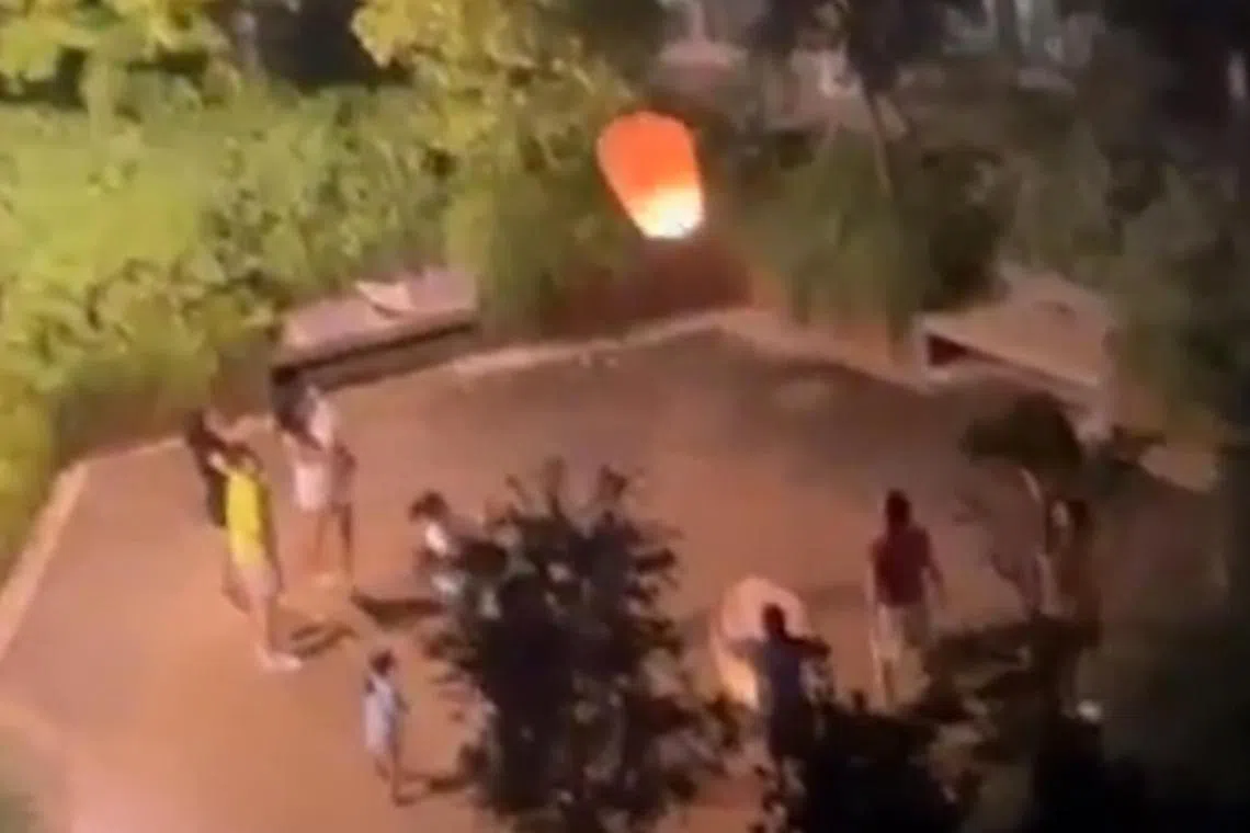 0630 ChanBK / 花园放飞孔明灯 金文泰新组屋居民忧引火