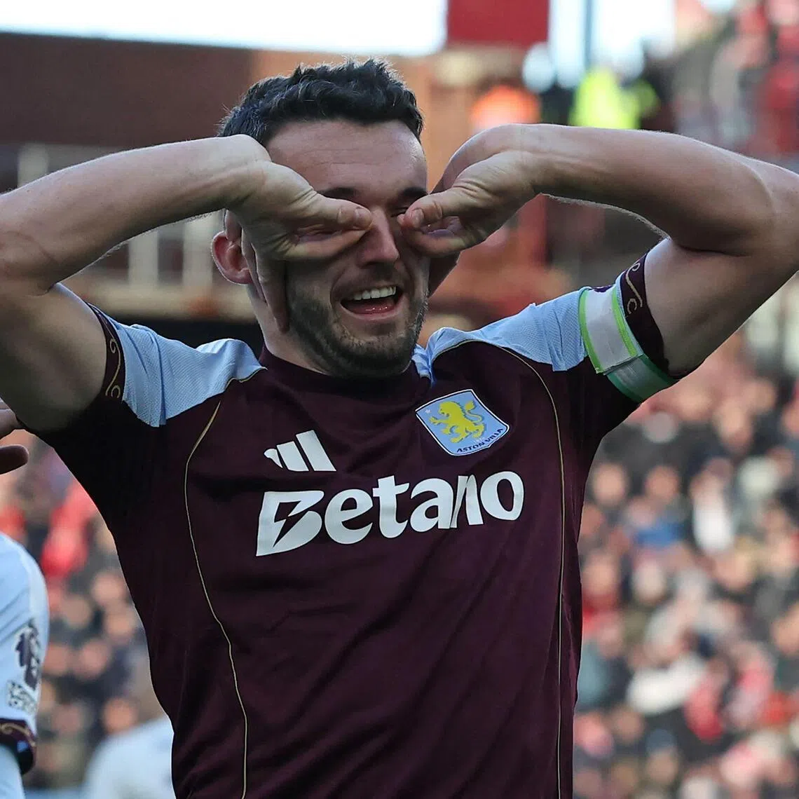 Aston Villa captain John McGinn celebrates after scoring the second goal in the 3-1 Premier League win over Nottingham Forest.