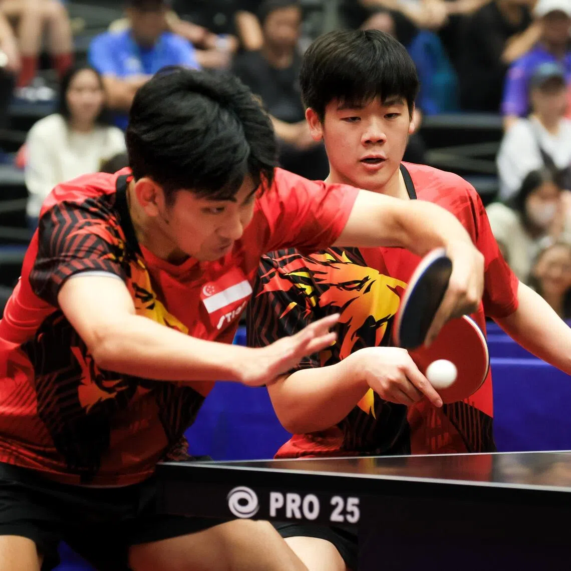 Koen Pang (left) and Zeng Jian helped Singapore reclaim the SEA Games mixed doubles gold on Dec 17.