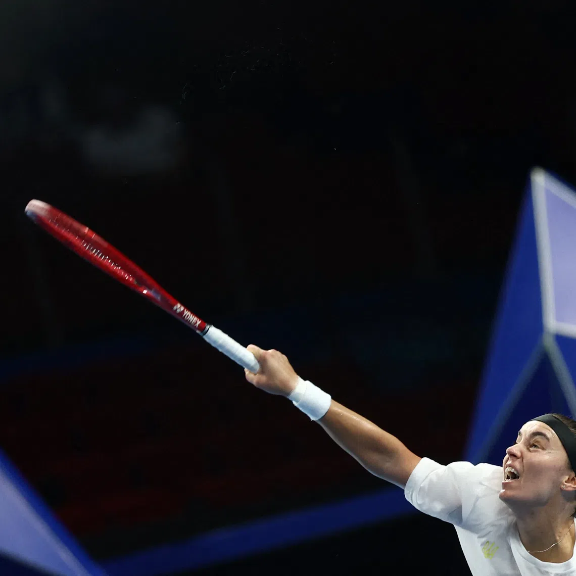 Tennis - Billie Jean King Cup Finals - Semi Final - Italy v Ukraine - Shenzhen Bay Sports Centre Arena, Shenzhen, China - September 26, 2026 Ukraine's Anhelina Kalinina in action during her match against Italy's Tyra Caterina Grant REUTERS/Tingshu Wang