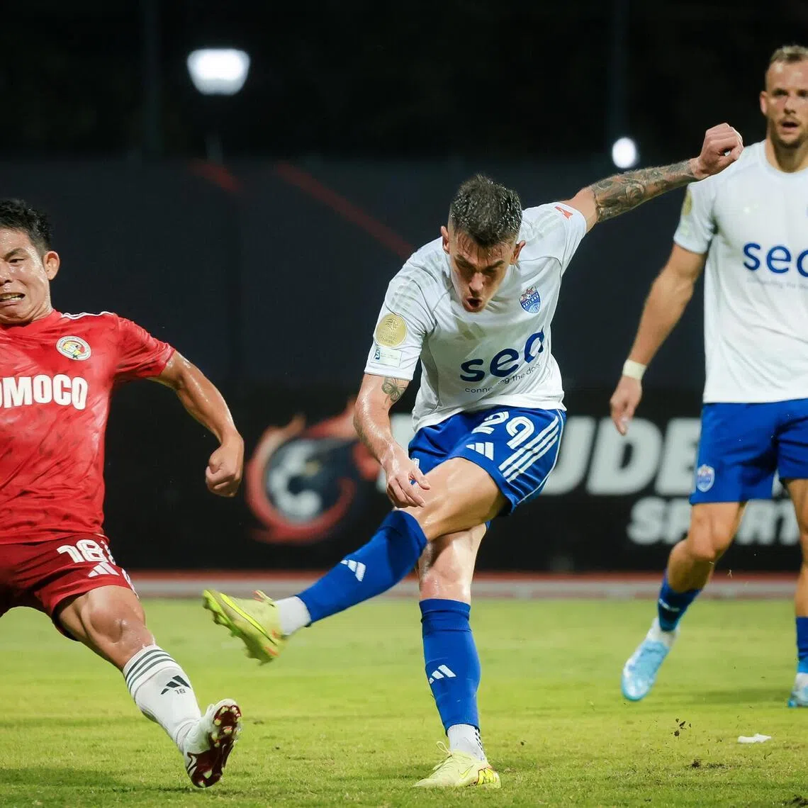 Lion City Sailors’ Diogo Costa (white, 29) scores the first goal against Balestier Khalsa during the Singapore Premier League match at Bishan Stadium on March 15, 2026.