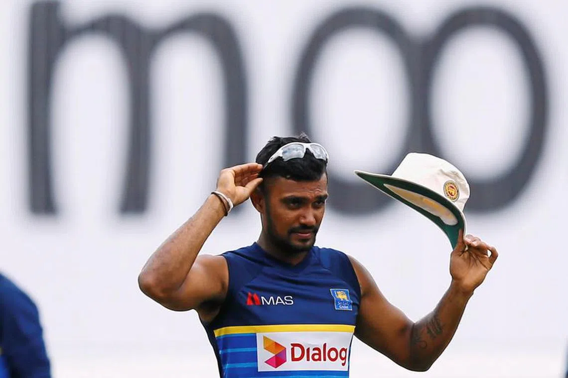FILE PHOTO:Cricket - Sri Lanka v South Africa -Second Test Match - Colombo, Sri Lanka - July 23, 2018 - Sri Lanka's Danushka Gunathilaka reacts before the match. REUTERS/Dinuka Liyanawatte/File Photo