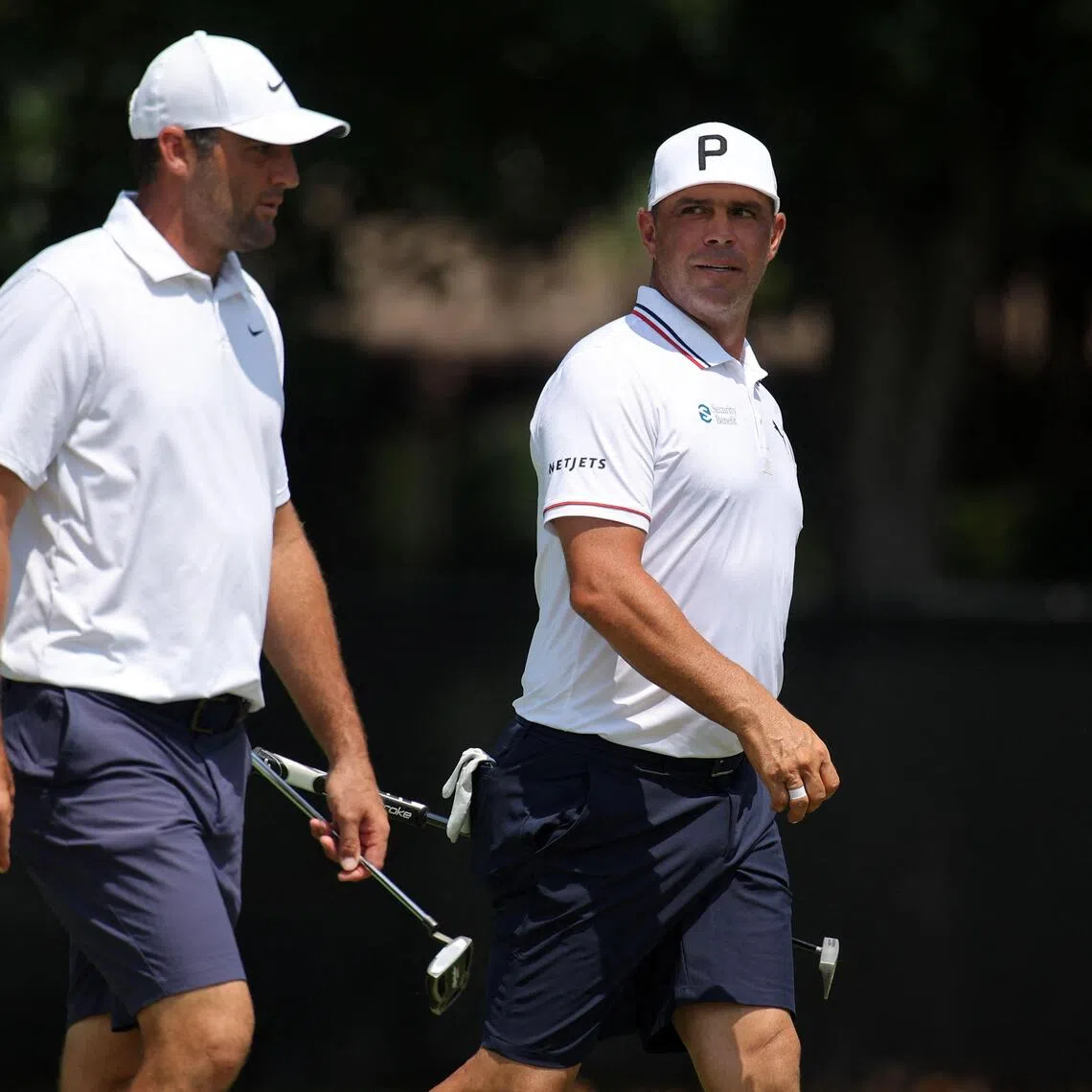Scottie Scheffler (left) and Gary Woodland at East Lake Golf Club in Atlanta, Georgia, on Aug 26.