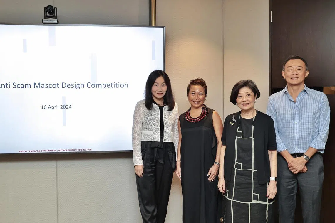 Panel of judges of anti-scam mascot design competition, launched by The Association of Banks in Singapore (ABS) on April 16 at the MAS Building. The fifth judge, Mr Tommy Lim, Creative Director, SPH Content Lab, was not present at the launch on April 16. (From left) Ms Loretta Yuen, Chair of the ABS Standing Committee on Fraud, Customer Education Workstream, and Head of Group Legal and Compliance, OCBC Bank, Ms Karen Ngui, Head of Group Strategic Marketing & Communications at ABS Chairman bank, DBS Bank, Mrs Ong-Ang Ai Boon, Director of ABS, and Mr Ng Khee Jin, Council Member of the National Crime Prevention Council and Creative
Partner, Kheej LLP. 

