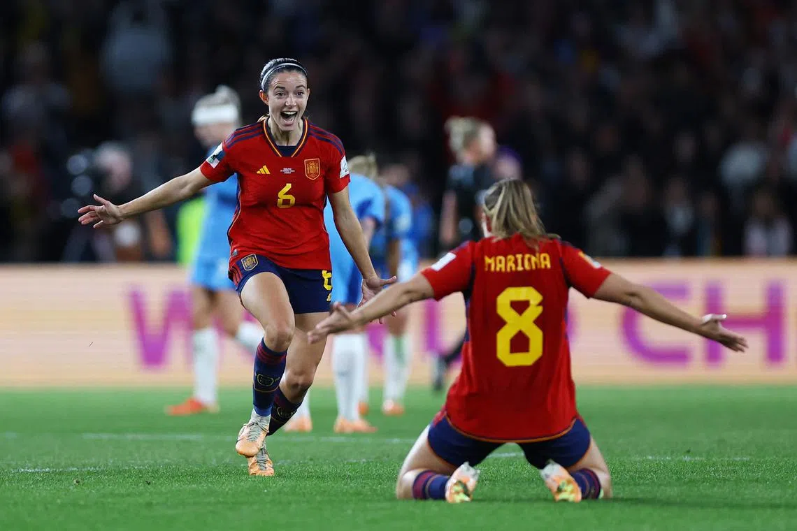 Spain's Mariona Caldentey and Aitana Bonmatí celebrate after winning the 2023 women's world cup.