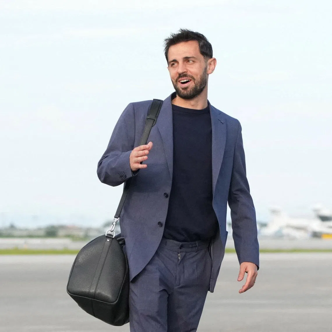 Soccer Football - FIFA World Cup 2026 - Portugal Arrive in Palm Beach - Palm Beach, Florida, U.S. - June 12, 2026 Portugal's Bernardo Silva arrives at the airport in Palm Beach ahead of the FIFA World Cup IMAGN IMAGES via Reuters/Jim Rassol